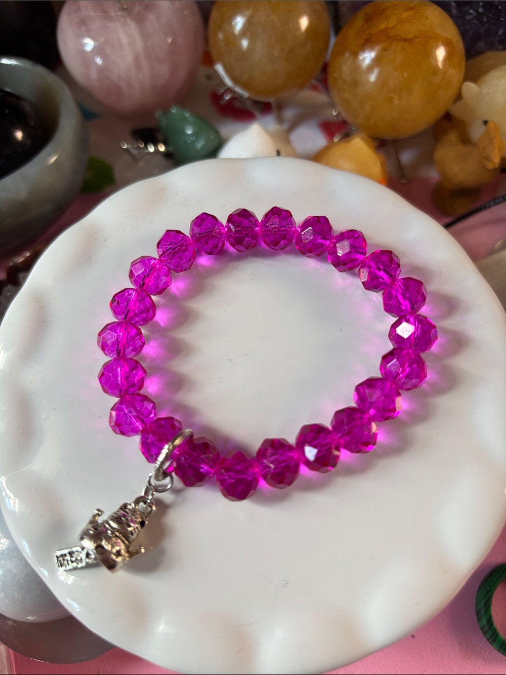 #2. Fuchsia Crystal Stretch Faceted 10mm Bracelet with Silver Charm